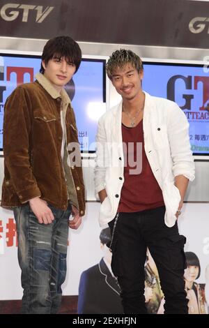 Japanese singer Ryohei Kurosawa, right, better known by the stage