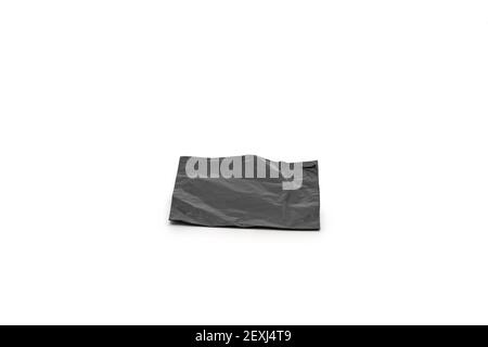 Isolated Black Postal Package from shopping online, is delivered to the buyer. It's shot in the studio light in front of white background Stock Photo