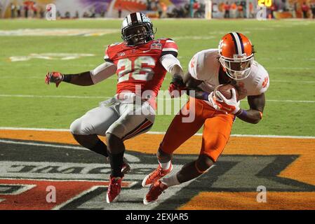 Clemson's Martavis Bryant makes a touchdown catch over Ohio State's Armani  Reeves in the third quarter in the Discover Orange Bowl at Sun Life Stadium  in Miami Gardens, Fla., on Friday, Jan.
