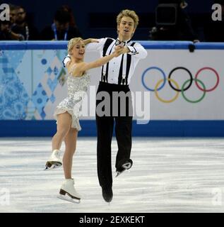 Penny Coomes and Nicholas Buckland of Britain compete in the team ice