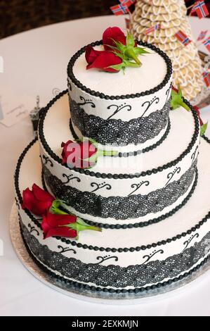 Wedding Cake Three Tiered Rose Covered Sweet Baked Treat Stock Photo