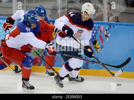 Czech Republic forward Patrik Elias, right, trips over Switzerland forward  Thierry Paterlini during first period action at the IIHF world hockey  championships, Thursday May 8, 2008, in Quebec City. (AP Photo/The Canadian