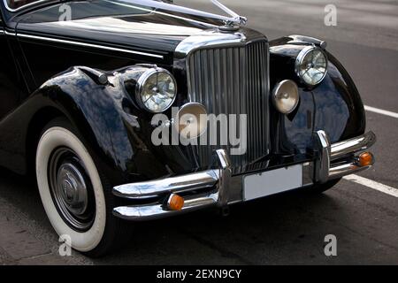 Antique Rolls Royce Emblem on car Stock Photo