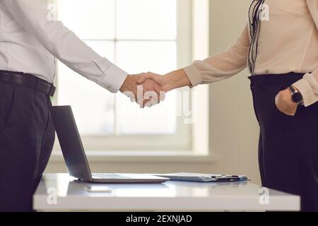 Handshake of people business partners after successful negotiations Stock Photo