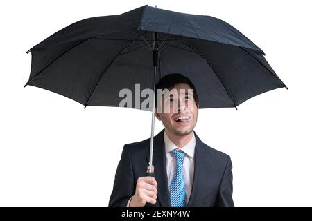 Young happy businessman with black umbrella. Isolated on white background. Stock Photo