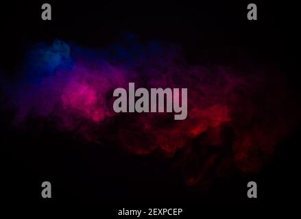 Motion blur of grainy steam in pink and blue light Stock Photo