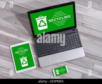Recycling concept shown on different information technology devices Stock Photo