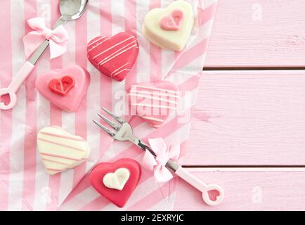 Colourful heart shaped petit fours Stock Photo