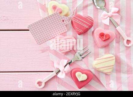 Colourful heart shaped petit fours Stock Photo