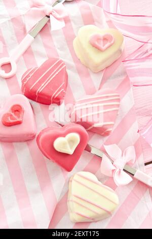 Colourful heart shaped petit fours Stock Photo