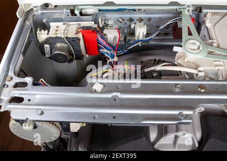 washing machine disassembled with open enclosure is ready for service Stock Photo
