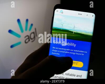 Mobile phone with logo of Australian utility company AGL Energy