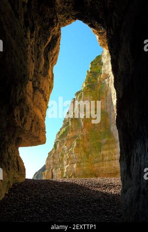 Sea cave near village of Beer , Devon on the Jurassic Coast Stock Photo