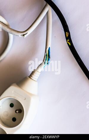 wire cable damaged by rabbit chewing Stock Photo