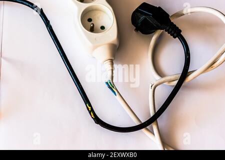 wire cable damaged by rabbit chewing Stock Photo