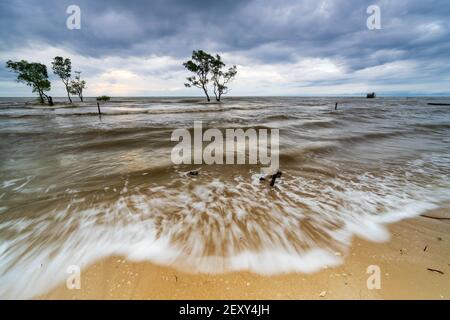 Cloudy Morning in Setapak Beach, Balikpapan, East Borneo, Indonesia Stock Photo