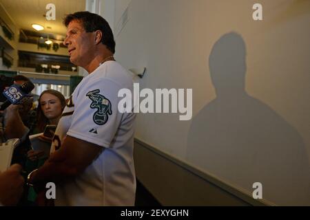 Former Major League Baseball player Jose Canseco takes a swing during the  Battle For Vegas Char …