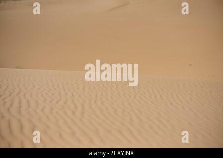 White beach sand shot up close Stock Photo
