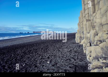 Coast of the Atlantic Ocean with black sand in Iceland. The Reynisfjara Beach. Stock Photo