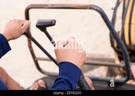 A man hand is controlling a backhoe, building contractor. Stock Photo