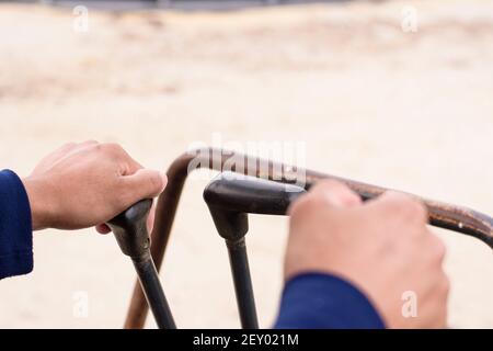 A man hand is controlling a backhoe, building contractor. Stock Photo