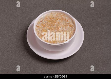 Khir or kheer payasam also known as Sheer Khurma Seviyan consumed mainly on Eid or any other festival in India / Asia. Served with dried fruit schnitz Stock Photo