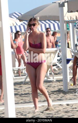 Italian Minister of Constitutional Reforms and Relations with Parliament Maria Elena Boschi at the beach with family in Forte dei Marmi, Italy on August 16, 2014. (Photo by Max Botta/Sipa USA)