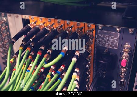 Connecting BNC connector for CCTV system. Broadcasting system room. Stock Photo
