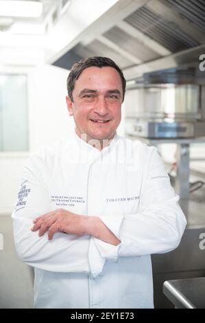 Baiersbronn, Germany. 05th Mar, 2021. Torsten Michel, chef de cuisine of the Schwarzwaldstube, stands in the interim restaurant 'temporaire - Schwarzwaldstube' of the Traube Tonbach after the digital awarding of the Michelin stars. The restaurants got their stars back, which they had lost after a fire in January 2020 in the parent house. Credit: Sebastian Gollnow/dpa/Alamy Live News Stock Photo