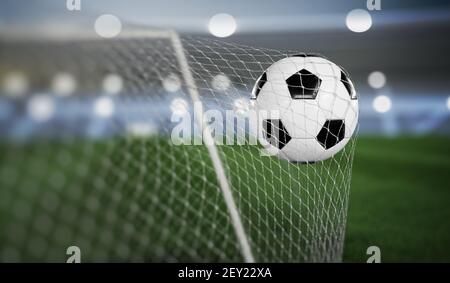 Goal - soccer or football ball in the net. 3D rendered illustration. Stock Photo