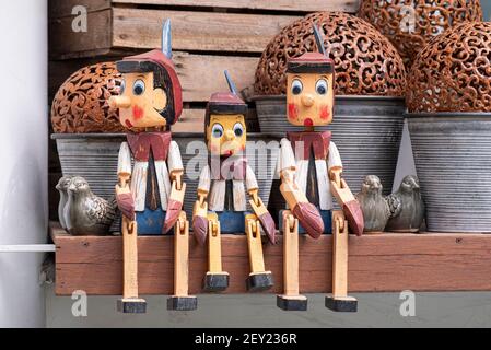 MOSCOW - JUL3: Wooden Pinocchio dolls as souvenir toy in Moscow, July 03. 2020 in Russia Stock Photo