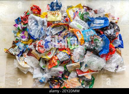 Recycling nightmare: A pile of various types of household single use plastics. Which can be recycled, which cannot? Stock Photo