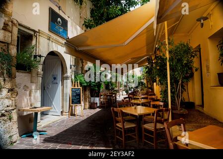 Greek cafe in Chania, Crete, the largest of the Greek Islands. Stock Photo
