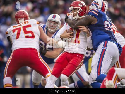 Buffalo Bills defensive tackle Marcell Dareus, center, passes Baltimore  Ravens tackle Michael Oher (74) to sack Ravens quarterback Joe Flacco (5)  during the second quarter at Ralph Wilson Stadium in Orchard Park