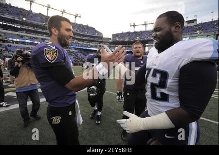 Baltimore Ravens quarterback Joe Flacco shakes hands with Tennessee Titans  tackle Michael Oher at the end of the fourth quarter on Nov. 9, 2014 at M&T  Bank Stadium in Baltimore. The Ravens