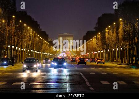 Paris, France - January 20, 2019 : The famous avenue of Champs Elysee in Paris by night Stock Photo