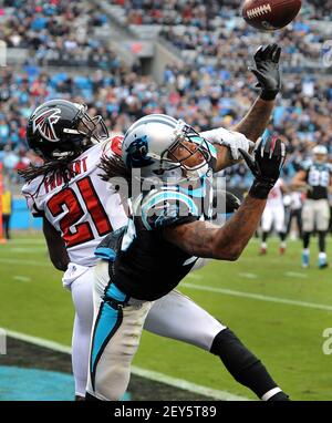 Carolina Panthers wide receiver Kelvin Benjamin (13) is tackled by