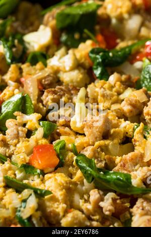 Healthy Homemade Veggie Egg Breakfast Scramble with Sausage and Spinach Stock Photo