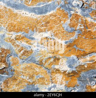 Rocks stone and red orange gneiss in the wall of morocco Stock Photo