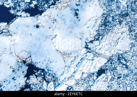 Big chunks of ice blocks forming a beautiful pattern, after the icebreaker Stock Photo