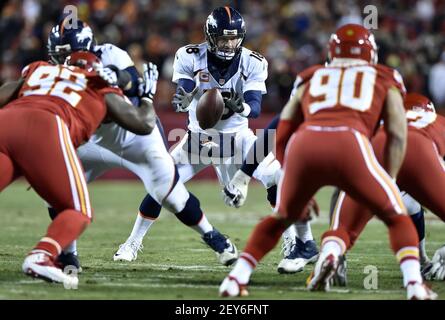 Denver Broncos star quarterback Peyton Manning prepars to throw a pass  during the team's National Football League game against the visiting San  Francisco 49ers at the Sports Authority Field at Mile High