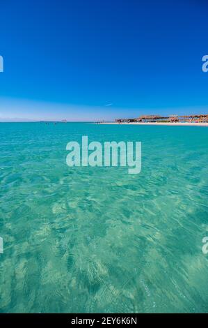 Orange Bay with white beach and crystal clear azure water - paradise coastline of Giftun island, Mahmya, Hurghada, Red Sea, Egypt Stock Photo