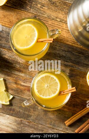 Homemade Hot Toddy Cocktail with Whiskey and Lemon Stock Photo