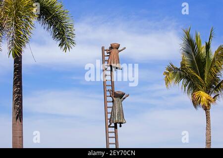 Sculpture En busca de la razón / In Search of Reason by Sergio Bustamante along the Malecón, walkway in beach resort Puerto Vallarta, Jalisco, Mexico Stock Photo