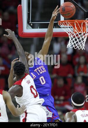 North Carolina State's Abdul-Malik Abu (0) battles with Miami's Kamari ...