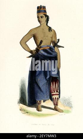 This 1840s illustration shows a Javanese man in court dress. The Javanese people are an ethnic group native to the Indonesian island of Java. With approximately 100 million people, they form the largest ethnic group in Indonesia. They are predominantly located in the central to eastern parts of the island. Stock Photo