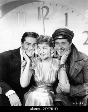 FRANCIS LEDERER CLAUDETTE COLBERT and DON AMECHE Publicity Portrait for MIDNIGHT 1939 director MITCHELL LEISEN screenplay Charles Brackett Billy Wilder Miss Colbert's Gowns by Irene Paramount Pictures Stock Photo