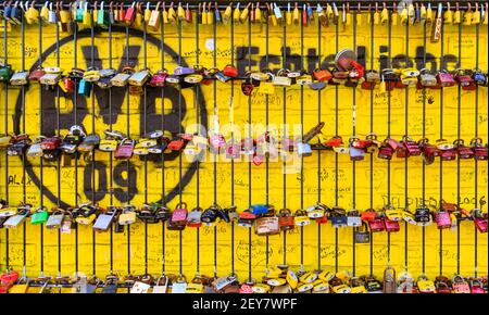 Dortmund, NRW, Germany. 05th Mar, 2021. Love locks and fan locks are padlocked to a 'Echte Liebe' (true love) fan wall also called 'wall of love' at Signal Iduna Park, Borussia Dortmund BVB09 football club stadium. The club plays an important part in the city's sporting life and cultural identity. North Rhine-Westphalia saw beautiful but cold sunshine today in most areas. Credit: Imageplotter/Alamy Live News