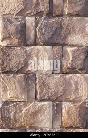 stone wall and rectangular granite blocks background Stock Photo