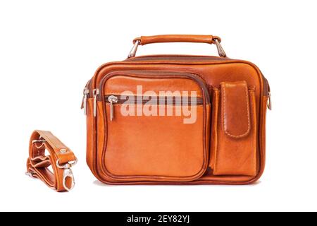 Men's vintage bag in brown color in a retro style with an unfastened strap isolated on a white background. Stock Photo
